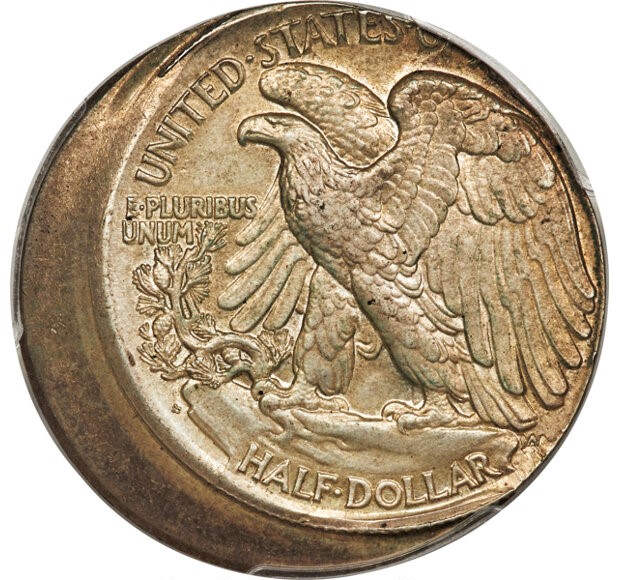 1919 Walking Liberty half dollar off-center strike error showing partial design with blank planchet area visible